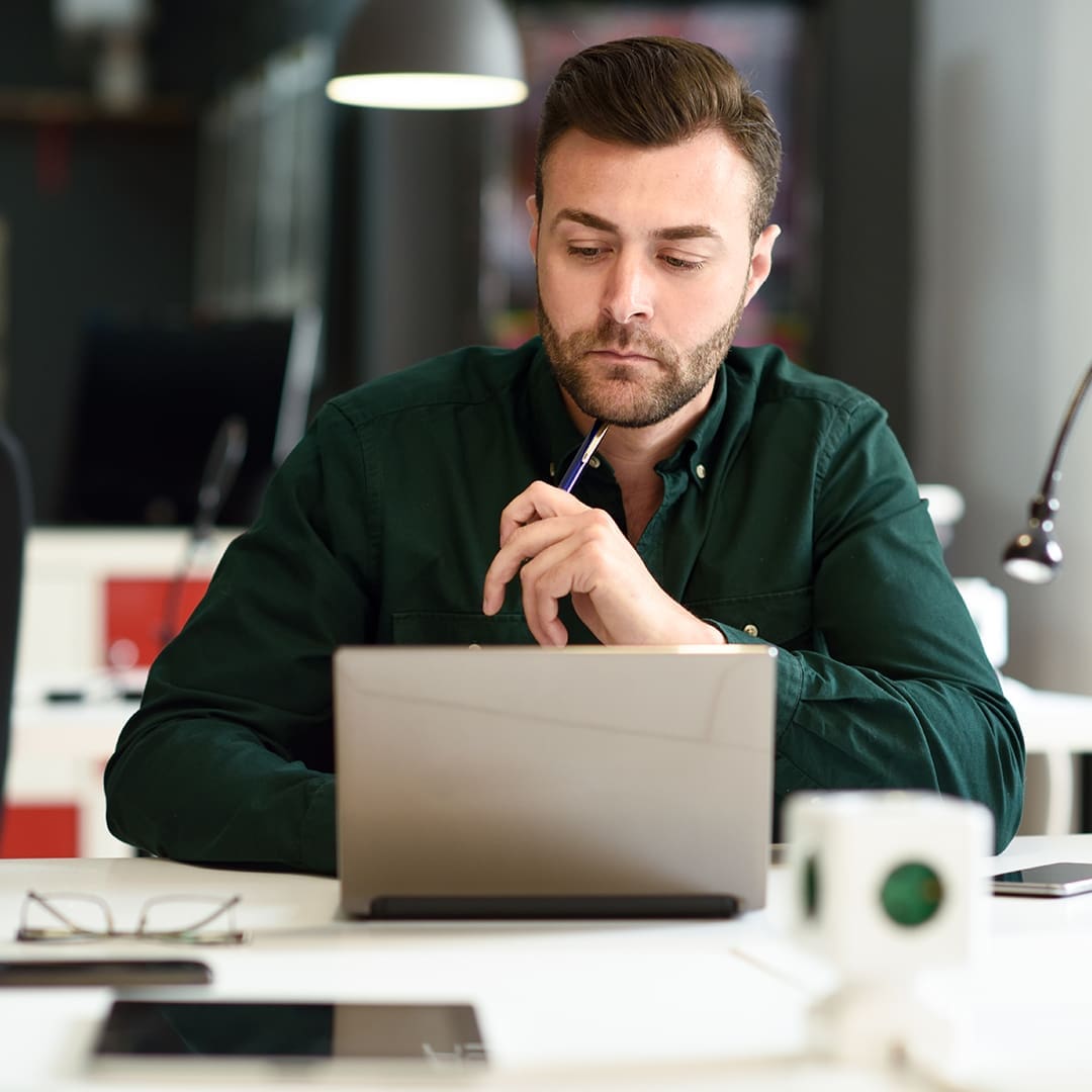 man studying online
